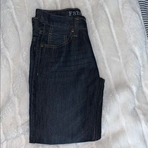Free Planet dark blue jeans.